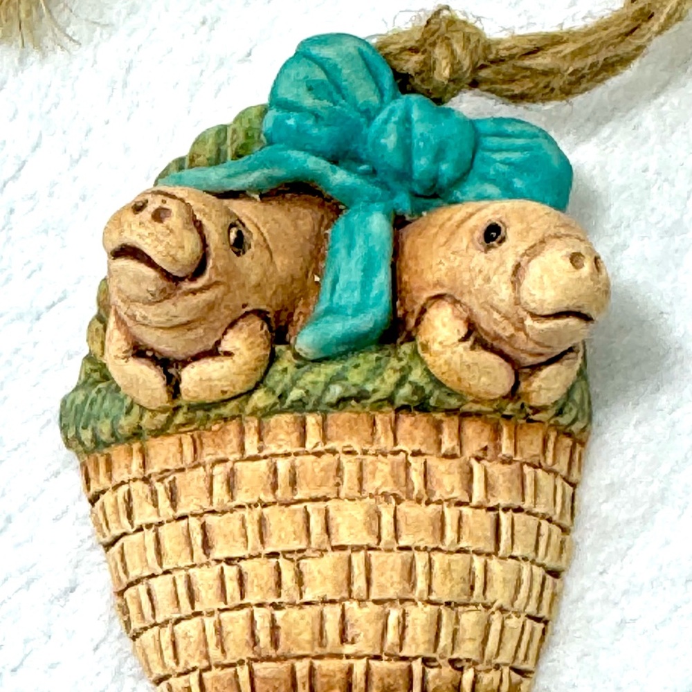 Manatees In Basket Kevin Rowley Ceramic Save The Manatees Ornament Green Bow